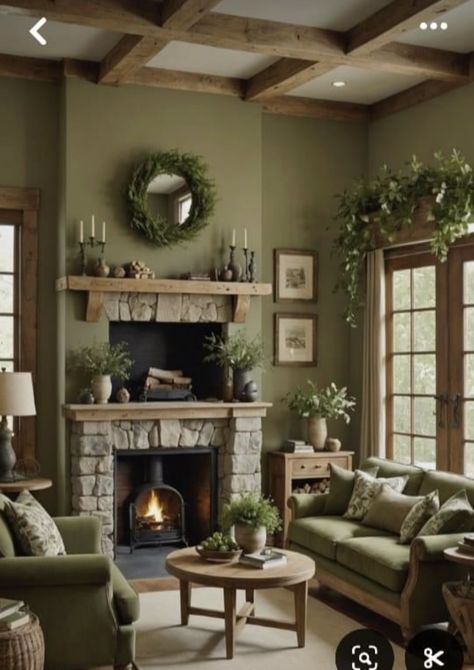 Farmhouse Colorful Living Room, Sage Green Living Room Fireplace, Green On Green Living Room, Farmhouse Living Room Green Walls, Family Room Colors Cozy, Green Living Room With Fireplace, Beside Fireplace Decor, Cottage House Living Room, Green Painted Living Room