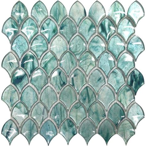 The sea blue fan shaped glass glossy mosaic wall tile is a unique way to add a dazzling finish to your home decor. This mosaic tile is perfect for transforming any space and adding a bright finishing touch that can enhance walls in the bathroom, shower, kitchen, garage, or more. This sea blue glass tile features low-maintenance for easy upkeep and long-lasting beauty with an elegant and dramatic effect everyone will appreciate. Bar Backsplash, Scale Tile, Vanity Backsplash, Blue Glass Tile, Bathtub Surround, Wall Fireplace, Room Accent Wall, Accent Walls In Living Room, Mosaic Wall Tiles