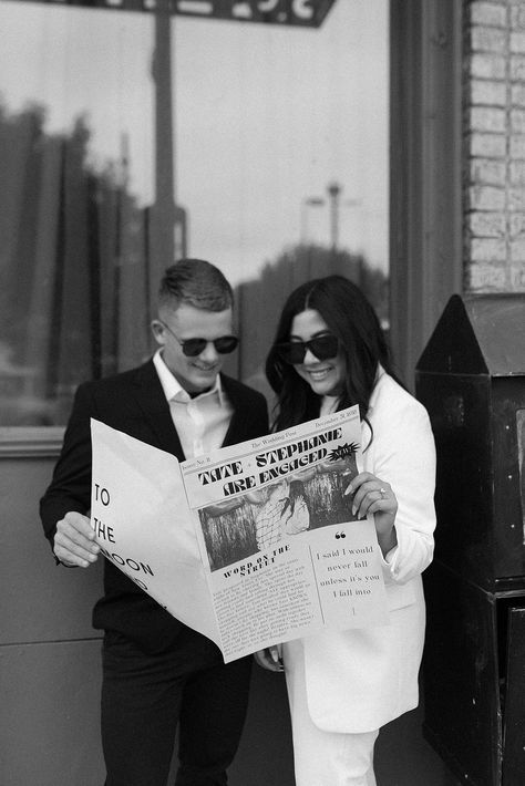 Wedding Newspaper Photoshoot, Newspaper Engagement Photos, Engagement Announcement Newspaper, Newspaper Baby Announcement, Engagement Newspaper, Downtown Portraits, Newspaper Announcement, Newspaper Photoshoot, Skyline Backdrop