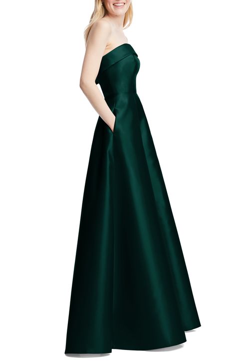 This strapless satin gown with a structured bodice and side-slant pockets features a twirl-ready full circle skirt. 54 1/2" length (size 8) Square neck Strapless Lined 100% polyester Dry clean or hand wash, line dry Imported Opera Dress, Strapless Long Dress, Navy Blue Bridesmaid Dresses, Alfred Sung, Deb Dresses, Full Circle Skirt, Guest Attire, Prom Dress Inspiration, Blue Bridesmaid Dresses