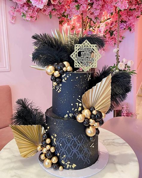 Our beautiful Gatsby inspired cake design certainly did not disappoint🖤✨ . 2 tier 6inch & 8inch chocolate vanilla fresh cream cake with buttercream coverage. . . #cake #cakes #birthdaycake #birthdaycakes #pinkcake #dripcake #redvelvetcake #floralcake #vanillacake #chocolatecake #creamcake #freshcreamcake #buttercreamcake #blackcake #goldcake #londoncakes #cakesoflondon #blackandgoldcake #cakesofig #cakesofinsta #classycake #cakestagram #cakegram #londonbaker #londonbakery #cakedesign #greatg... Black 2 Tier Cake, Roaring 20s Birthday Cake, 1920s Themed Cake, Gatsby Cake Birthday, Great Gatsby Cake For Men, Great Gatsby Birthday Cake, The Great Gatsby Cake Ideas, Great Gatsby Cake Ideas, Great Gatsby 40th Birthday Cake