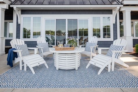 white adirondack chairs and white fire pit table Lake House Patio, White Adirondack Chairs, Living Independently, Colonial Beach, Adirondack Chairs Patio, Wood Adirondack Chairs, White Patio, Jill Zarin, Pool Backyard