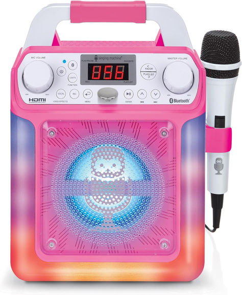 The Singing Machine Groove Mini Portable Karaoke System features voice effects, plays music via Bluetooth or line-in. MP4 & MP3+G ability to display lyrics on your TV. Features a built-in speaker and one wired microphone Sound Like a Star: Exciting features like echo control, two mic inputs for duets, recording and playback abilities, and LED lights will make it feel like you’re on stage! Connect to a TV via HDMI for visual lyrics so guests can sing along! Price:$38.71 FREE Returns 2000s Party Theme, Best Karaoke Machine, Mini Karaoke, Singing Games, Karaoke Speaker, Karaoke System, Karaoke Machine, Karaoke Party, Colored Led Lights