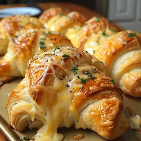 Cheesy Chicken Crescent Rolls are more than just a meal; they represent the epitome of comfort food, marrying the tender juiciness of chicken with the melt-in-your-mouth bliss of mozzarella cheese, ... Read more Things To Do With Crescent Roll Dough, Chicken Stuffed Croissants, Stuffed Rhodes Rolls Recipes, Recipes Using Canned Crescent Rolls, Chicken Puffs Recipe Crescent Rolls, Chicken Cresent Roll Dinner Recipe, Cheesy Chicken Crescent Rolls, Chicken And Crescent Roll Recipes, Pillsbury Croissant Recipes