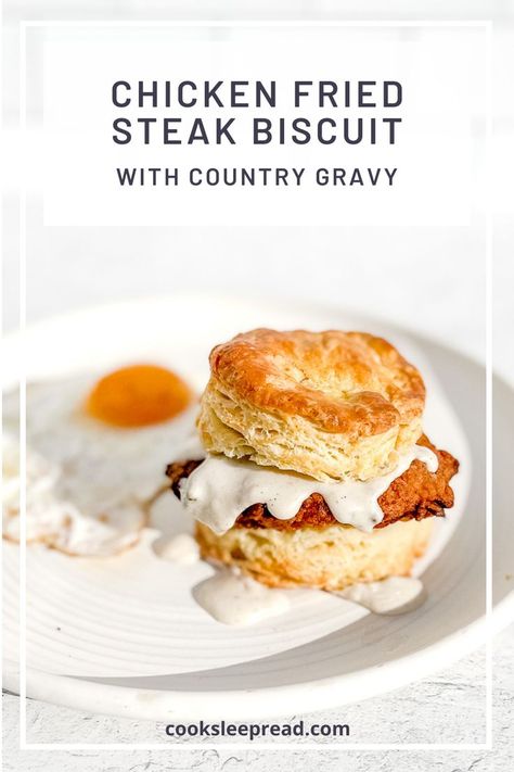 Chicken Fried Steak Biscuit with country gravy with a fried egg on a white plate. Steak Biscuits Breakfast, Chicken Fried Steak Breakfast, Chicken Gravy And Biscuits, Steak Biscuits, Breakfast Steak, Breakfast Biscuit Recipe, Breakfast Gravy, Flaky Buttermilk Biscuits, Chicken Biscuits