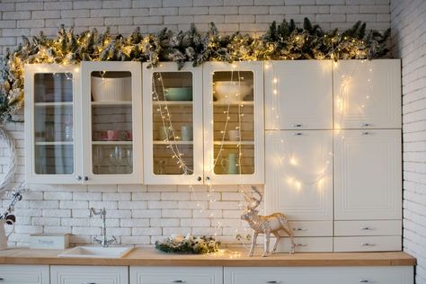 Garland Above Kitchen Cabinets, Christmas Decor Above Kitchen Cabinets, Decor Above Kitchen Cabinets, Top Of Kitchen Cabinets, Decorating Above Kitchen Cabinets, Top Of Cabinets, Kitchen Photography, Above Kitchen Cabinets, Above Cabinets