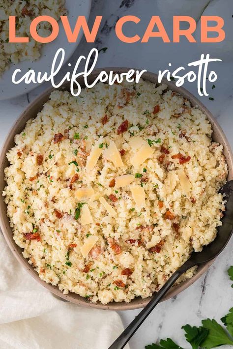 Our Creamy Cauliflower Risotto is a satisfying side dish that cuts out the carbs of traditional risotto! Made with vegetables, plenty of creamy Parmesan, and bits of crispy bacon. This cauliflower risotto recipe is a must make! Califlower Recipes Risotto, Riced Cauliflower Recipes, Traditional Risotto, Cauliflower Recipes Low Carb, Veggie Risotto, Cauliflower Risotto Recipes, Cauliflower Rice Risotto, Cauliflower Risotto, Bacon Cauliflower