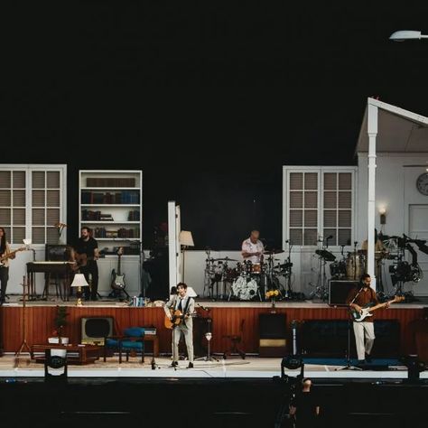 Relying on social media algorithms for visual inspiration has led to stage designs becoming increasingly repetitive according to Tobias Rylander, the designer behind The 1975's viral house set. The 1975 Stage, Nice Houses, Stage Designs, Nice House, Building Roof, Good Readers, Design 2023, Divider Wall, Rita Hayworth