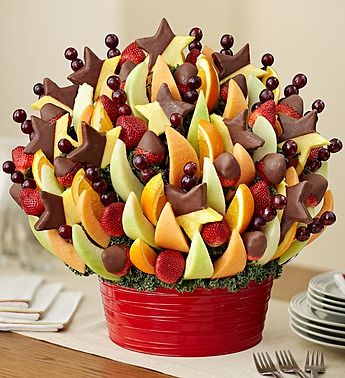 It’s party time—get everyone’s mouth watering with this great big arrangement of fresh and tasty fruit! Displayed in a bright red reusable tin, our crowd-pleasing creation is loaded with dipped star-shaped pineapples, strawberries, melon and more sweet surprises to satisfy all those hungry guests. Chocolate Covered Pineapple, Fruit Bouquets, Edible Fruit Arrangements, Thanksgiving Fruit, Fruit Delivery, Holiday Fruit, Chocolate Covered Strawberries Bouquet, Chocolate Dipped Fruit, Fruit Arrangements