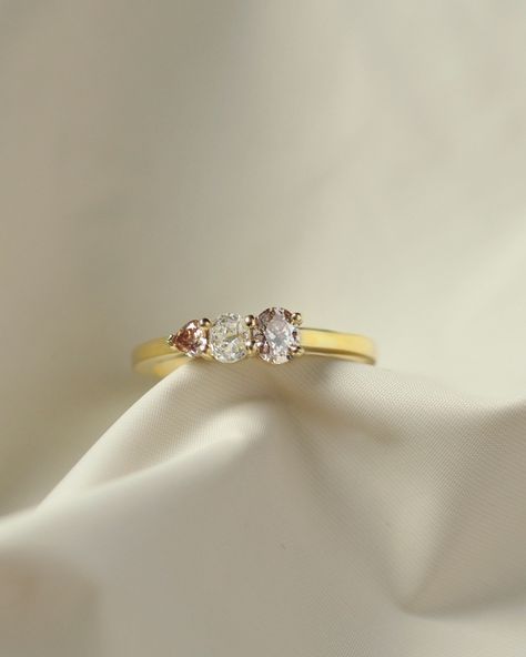 SIMPLICITY Keeping things simple today with a couple of our one of a kind asymmetric diamond engagement rings. A triple oval Salt and Pepper Diamond Ring pictured with our latest Sitara Diamond Ring. Set in yellow gold, and with a selection of pinky-champagne and old cut diamonds - this is one of our prettiest pieces. Still hot off the bench, but I'll do my best to get this one up onto the website this week! ✦ #diamondring #alternativediamondring #saltandpepperdiamond #salt&pepperdiamond Asymmetrical Engagement Ring, خواتم خطوبة, Salt And Pepper Diamond Ring, Pepper Diamond Ring, Diamond Ring Set, Pepper Diamond, Ring Pictures, Salt And Pepper Diamond, Salt And Pepper