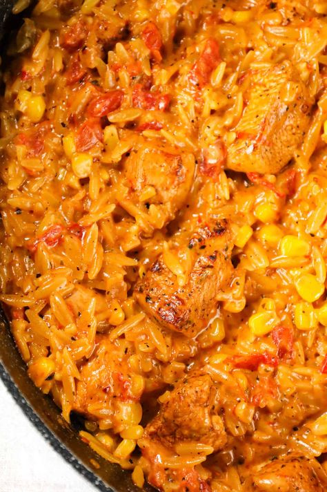 Cajun Chicken Orzo is a delicious one pot dinner recipe loaded with chicken breast chunks, corn, Rotel diced tomatoes and orzo pasta all in a creamy Cajun sauce. Cajun Orzo Recipes, Cajun Chicken Orzo Recipes, Chicken Sausage Orzo Recipes, Cajun Dirty Orzo, One Pot Chicken And Sausage Cajun Pasta, Cajun Chicken Orzo, Corn Rotel, Creamy Orzo Recipes, Chicken Orzo Skillet With Sun-dried Tomatoes