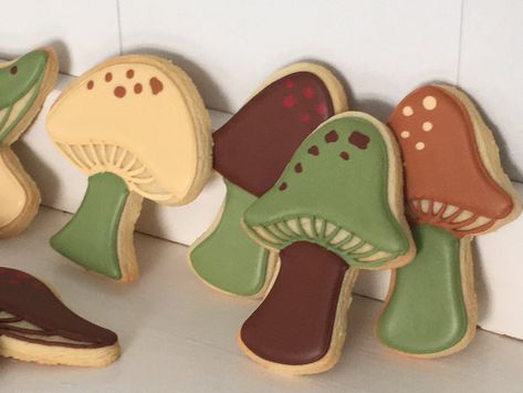 Why go out into the scary woods picking wild mushrooms when you can just eat these lovely woodland mushroom sugar cookies. They are carefully hand decorated and unique in their various colors. You will get a mix of 1 dozen of these spectacular cookies. They come individually shrink wrapped to retain their freshness for up to 3 weeks. They make a fabulous gift! BEFORE YOU PLACE YOUR ORDER - Please click on the shipping and policies tab right above to get current turnaround times for processing yo Mushroom Sugar Cookies, Scary Woods, St Patrick's Day Cookies, Mushroom Cookies, Flooding Cookies, Fairy Nursery, Forest Baby Showers, Baby Room Organization, Shower Desserts