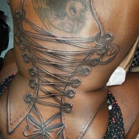 Corset Tattoo, Tattoos On Back, Tattoo On The Back, Tattoo Son, Catrina Tattoo, Girl Back Tattoos, Ribbon Tattoos, Black Girls With Tattoos, Octopus Tattoo