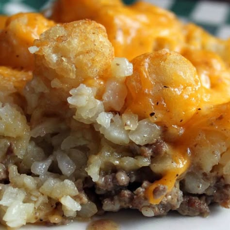 This hamburger tater tot casserole recipe has a layer of ground beef in a homemade cream sauce, topped with crispy baked tater tots and melted cheddar cheese!  A full meal in itself. Tator Tot Casserole With Cream Of Chicken Soup, Recipe Casserole, Cauliflower Tots, Cauliflower Casserole Recipes, Tater Tot Casserole Recipes, Sweet Potato Recipes Casserole, Healthy Potato Recipes, Tot Casserole, Cauliflower Casserole