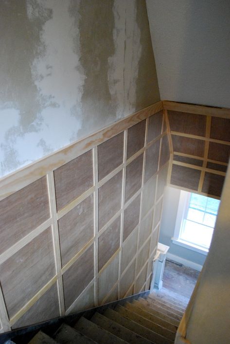 Stairway inspiration: Square board and batten to hide damaged walls - NewlyWoodwards Square Board And Batten, Board And Batten Stairwell, Stairway Walls, Basement Home Theater, Basement Remodel Diy, Staircase Remodel, Staircase Wall, Decor Fireplace, Basement Stairs