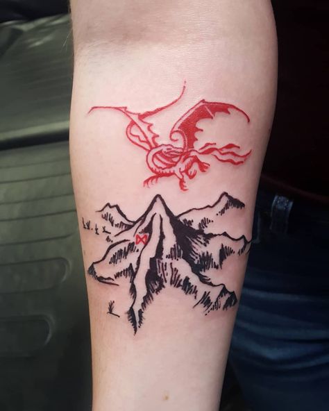 @melpractitioner That's what I'm tolkien' about!! Thank you to Alyson for letting me do this Lonely Mountain tattoo !!! Come see Mel for your LOTR tat needs !! #lordoftherings #thehobbit #smaug #winnipegtattoos #ironlotus #lineworktattoo #forearmtattoos #lotr #lotrtattoo Lord Of The Rings Smaug Tattoo, The Hobbit Smaug Tattoo, The Hobbit Tattoo Ideas, The Lord Of The Rings Tattoo, Lord Of The Ring Tattoo, Hobbit Tattoo Ideas, Smaug Art, The Hobbit Tattoos, Tattoos Lord Of The Rings