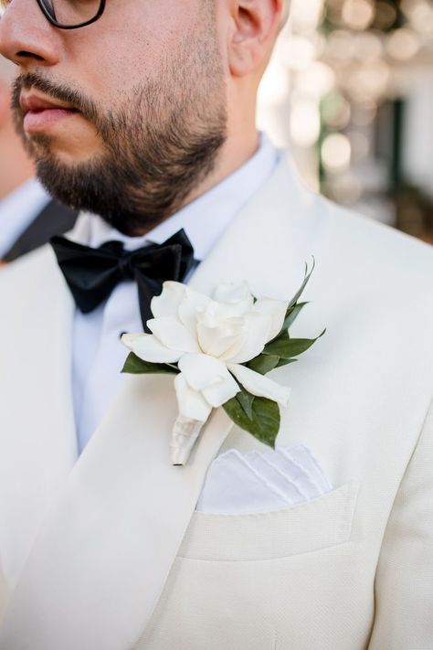 A single bright white gardenia for a dapper groom! All White Groom Suit, All White Groom, Gardenia Boutonniere, White Groom Suit, Groom Suit White, Gardenia Bouquet, Boutineer Wedding, Gardenia Wedding, Petal Veil