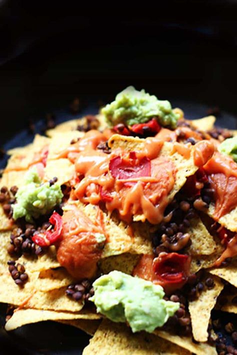 The ultimate vegan lentils nachos with guacamole and salsa. Such a delicious snack. Visit thetortillachannel.com for the instructions and video. #nachos #vegannachos #ultimatenachos #lentilsnachos #snack #thetortillachannel Mexican Appetizers Easy, Bite Size Appetizers Easy, Mexican Appetizer, Tortilla Recipes, Healthy Tortilla, Nacho Dip, Mexican Appetizers, Vegan Nachos, Bite Size Appetizers