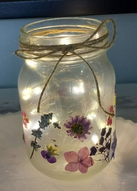 How To Decorate A Mason Jar, Fairy Light In Jar, Flower Jars Decoration, Decorated Candle Jars, Decorated Jars Ideas, What To Do With Glass Jars, Pressed Flower Jars, Fairy Light Mason Jars, Pressed Flower Mason Jar