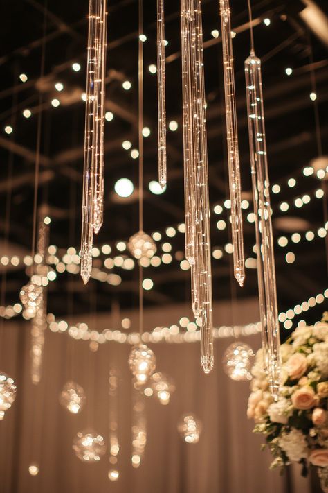 Wedding ceiling display. Crystal Prisms Assembly interspersed with twinkling string lights.

Ignite your imagination and illuminate your most magical day with our compilation of 36 Enchanting Wedding Light Installation Ideas. Who knew that the right lighting could add an extra layer of whimsical charm and turn an ordinary venue into a mesmerizing wonderland? Dive into this enlightening treasure of ideas, perfect…

Read more: https://tastywed.com/generated-post-36-enchanted-wedding-light-installation-ideas/ Wedding Crystal Decor, Ceiling Display, Crystal Wedding Theme, Crystal Wedding Decor, Twinkling String Lights, Winter Wedding Cape, Installation Ideas, Wedding Ceiling, Vintage Car Wedding