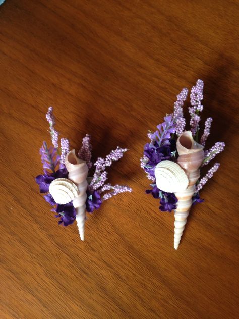 Shell Boutonnière for purple beach themed wedding. Smaller one for ring bearer. All products found at Michael's craft store. Purple Beach Wedding, Purple Groomsmen, Beach Wedding Purple, Wedding Flowers Beach, Seashell Bouquet, Beach Wedding Decorations Reception, Beach Wedding Centerpieces, Purple Beach, Creative Wedding Favors