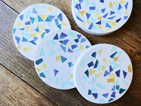 DIY Modern Terrazzo Coasters | eHow | eHow Neutral Candles, Terrazzo Coasters, Diy Terrazzo, Modern Terrazzo, Homemade Coasters, Mosaic Coffee Table, Mosaic Candle, Marble Fireplace Surround, Mosaic Flower Pots