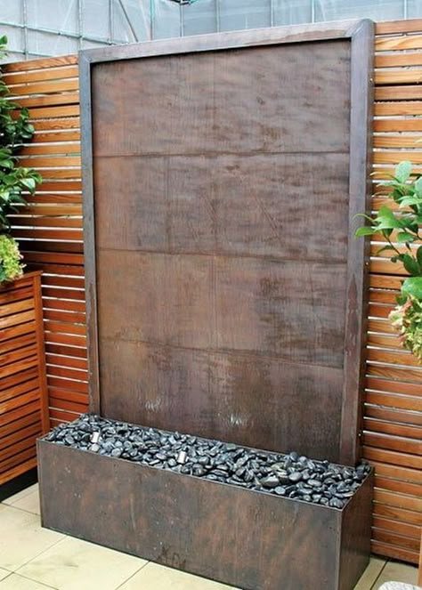 25 Money-Saving DIY Backyard Projects...to transform your space!! | Make It and Love It Outdoor Wall Fountains, Pavers Diy, Water Wall Fountain, Diy Water Feature, Glass Waterfall, Water Feature Wall, Pavers Backyard, Outdoor Water Feature, Outdoor Water Features