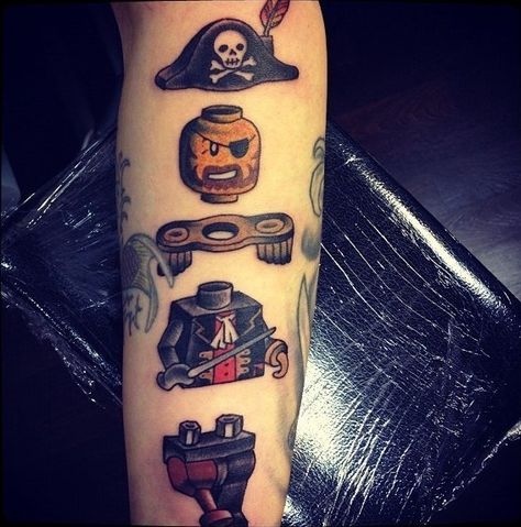 Ahoy matey! How’s it Lego-ing? | 32 Lego Tattoos That Will Thrill Your Inner Child Lego Tattoo, Pirate Tattoo, Traditional Style Tattoo, Lego Man, Old School Tattoo, Skin Art, Love Tattoos, Body Mods, A Tattoo