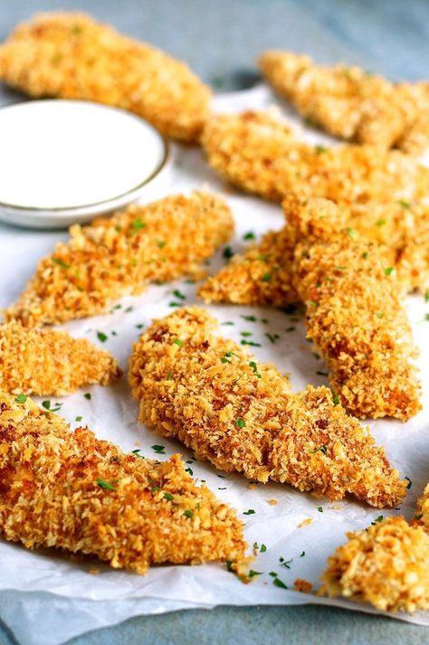 Truly Golden and Crunchy Baked Breaded Chicken Tenders (Crumbed) - how to make breaded / crumbed chicken in the oven that come out evenly golden and with out getting your fingers caked with batter and breadcrumbs. Oven Baked Chicken Tenders, Baked Breaded Chicken, Crispy Oven Baked Chicken, Breaded Chicken Tenders, Chicken Shawarma Recipe, Baked Chicken Tenders, Ground Chicken Recipes, Recipetin Eats, Chicken Tender Recipes