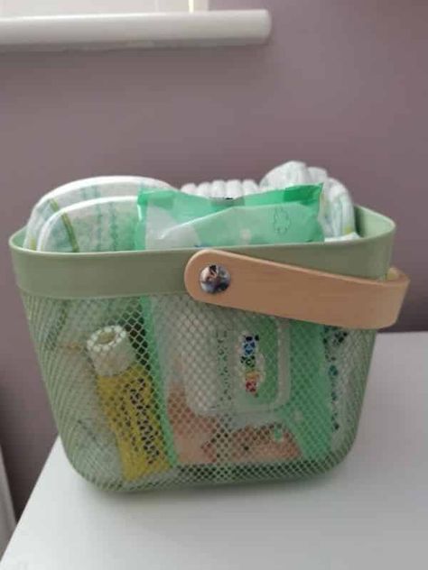 IKEA Risatorp metal basket for diapers and wipes - nursery hacks Ikea Nursery Ideas, Living Room Urban, Nursery Book Storage, Twin Nursery Room, Project Nursery Girl, Ikea Nursery Hack, Ikea Basket, Nursery Hacks, Ikea Spice Rack