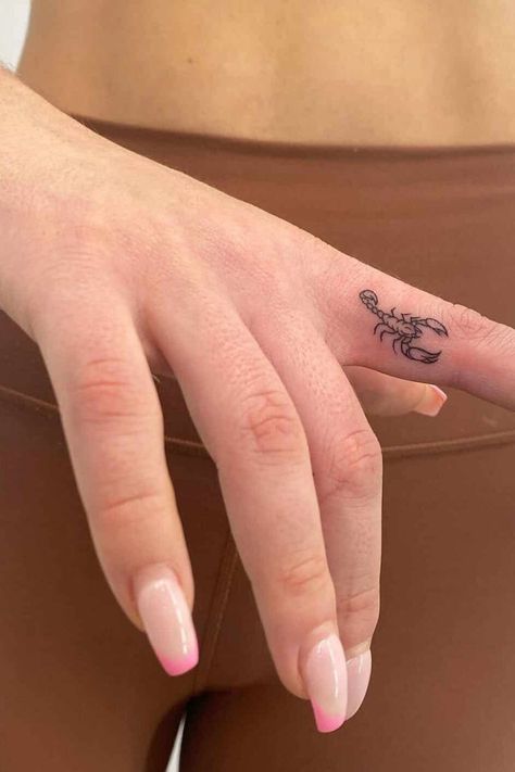 Check out these gorgeous scorpio tattoo ideas. We are obsessed with these Scoprio tattooos for women. They are stunning! Cool Finger Tattoos, Finger Tattoo Ideas, Finger Tattoos For Couples, Cute Finger Tattoos, Small Finger Tattoos, Finger Tattoo For Women, Hand And Finger Tattoos, Scorpio Tattoo, Scorpion Tattoo