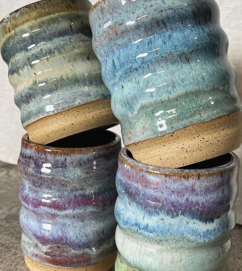 Cheri Downey | Ceramicist on Instagram: "More larger wavy/bubble cups headed to Hillsdale Homes soon 🤍  #ceramics #pottery #potteryasmr #glaze #ceramicglaze #glazelayering #supportsmallbusiness #giftideas #homedecor #cup #handmademug #madeinaskutt #fired #shimpowheel #wheelthrown #mugshot #brownclay #speckledclay #cupcollection #bubblecups" Bubble Pottery, Bubble Mug, Pottery Inspo, Collections Of Objects, Clay Mugs, Ceramics Pottery, Pottery Designs, Glazes For Pottery, Mug Shots