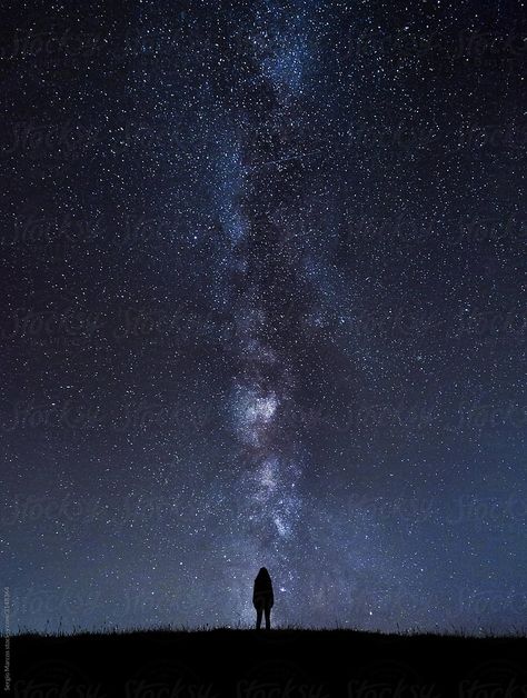 Silhouette Of Unrecognizable Person Standing Under Cosmic Sky At Night | Stocksy United Under Stars Aesthetic, Stars Aesthetic Night Skies Wallpaper, Stary Night Sky Aesthetic, Person Silhouette Standing, Night Stars Photography, Sky Stars Aesthetic, Dark Sky With Stars, Laying Under The Stars, Night Sky Pictures