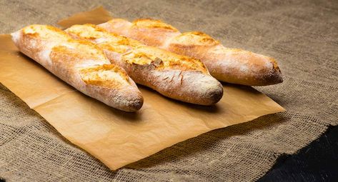 Poolish Baguette Authentic Recipe | TasteAtlas Baguette Recipe, French Baking, Pain Sans Gluten, Bread Rolls Recipe, Pan Sin Gluten, Sans Gluten Sans Lactose, Baking Stone, Bread Roll, Roll Recipe