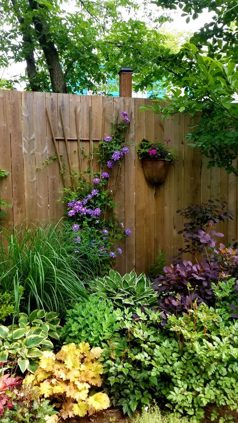 Elevate your garden's design with "5 Garden Wall Ideas That You’ll Love". Whether it’s climbing plants on trellises or sleek wooden barriers, these ideas are sure to enhance your outdoor space. Turn your garden into a serene haven today! French Country Living Room Decor Ideas, Garden Wall Ideas, French Country Living Room Decor, Country Living Room Decor, Picturesque Garden, French Country Decorating Living Room, Garden Wall Designs, Garden Backdrops, French Country Living