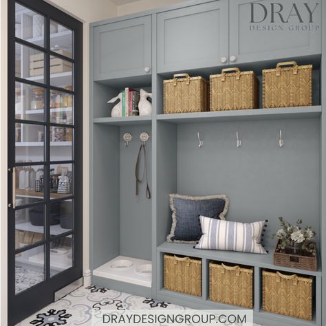 An inviting and organized mudroom and pantry with a timeless encaustic porcelain tile. Custom millwork designed by Dray Design Group in a Benjamin Moore French Toile paint finish. Dog Bowl Station, Walk In Pantry Design, Mudroom And Pantry, Dream Mudroom, Mudroom Dog Room, Transitional Laundry Room, Traditional Laundry Room, Mudroom Remodel, Custom Laundry Room