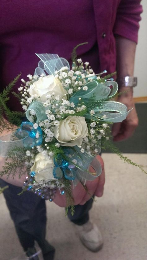 Wrist corsage with white spray roses and babies breath. Aqua acrylic flowers and aqua ribbon and rhinestones in blue to add the bling that the ladies love. Corsage Ideas, White Spray Roses, Woodland Floral, Kalispell Mt, Prom Corsage, Corsage Prom, Babies Breath, Prom Flowers, Order Flowers Online