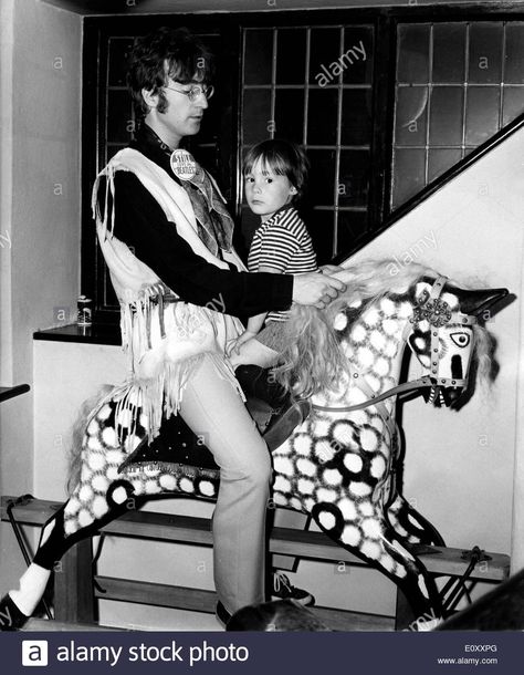 John Lennon and his son Julian riding a rocking horse Stock Photo Harry Benson, Beatles Ringo, Life Image, Julian Lennon, Tony Evans, Beatles Pictures, John Lennon Beatles, John Charles, Beatles John