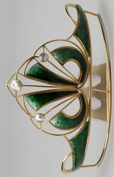 ENAMEL AND MOTHER-OF-PEARL HAIR COMB, CIRCA 1900. Of stylised foliate open work design, decorated with green enamel graduating in colour, accented with mother-of-pearl, to a hinged comb fitting, inner circumference approximately 135mm, signed A & J.S, fitted case, A & J. Smith, Jewellers, Aberdeen. Jeweled Hair Comb, Clothes Character Design, Crown And Tiara, Fantasy Crown, Piskel Art, Star Wars Fashion, Crown Tiara, A Pony, Work Design