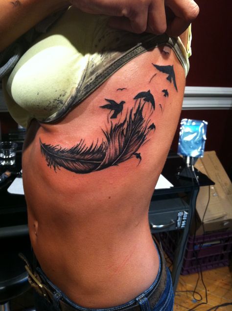 Cover Up Tattoos Underboob, Leaf Tattoo Under Breast, Feather Tattoos Underboob, Underboob Cover Up Tattoo, Rib Tattoos For Women Cover Up, Feather Back Tattoo, Feather Underboob Tattoo, Underboob Tattoo Coverup, Side Stomach Tattoos Women