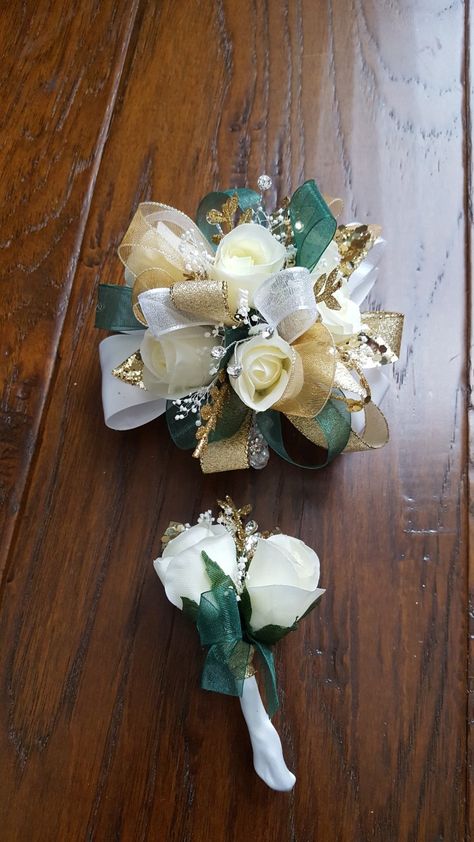 Emerald green and gold corsage set from Hen House Designs www.henhousedesigns.net Corsage And Boutonniere Set Green, Jade Green Corsage, Green And Gold Corsage Prom, Emerald Green And Gold Corsage, Green Prom Corsage And Boutonniere, Prom Corsage And Boutonniere Emerald Green, Prom Flowers Corsage Green Dress, Emerald Green Bouquet Prom, Green And Gold Boutonniere