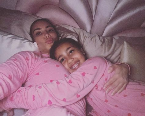 KIM Kardashian shared makeup-free and unfiltered photos as she twinned with her daughter North. The KUWTK star, 41, took a break from the recent drama with ex Kanye West to enjoy some quality time with their eldest daughter, as they matched in pink heart patterned pyjamas. The SKIMS founder swapped her usual glamourous attire for […] Heart Pajamas, Kim Kardashian And North, Kardashian Kids, Kim Kardashian And Kanye, Sofia Richie, Reality Tv Stars, New Boyfriend, Night Suit, Kardashian Jenner