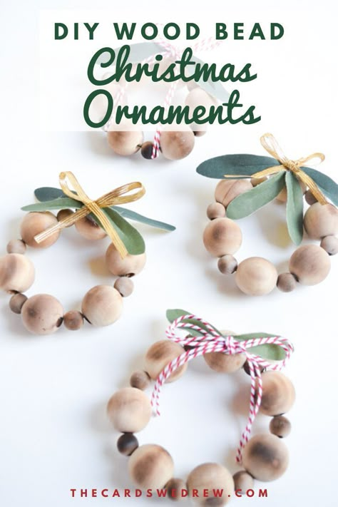 Learn how to make these easy DIY Wood Bead Ornaments and skip over the Etsy sellers! These DIY Christmas Ornaments are cute and fun and can be great for a farmhouse theme or as decorations on Christmas packages. All you need are wood beads, floral wire, and some decorations! #woodbead #ornaments #DIY #Christmas #farmhouse Wood Bead Christmas Ornaments, Wood Bead Ornaments, Bead Christmas Ornaments, Wood Bead Christmas, Natal Natural, Beaded Ornaments Diy, Juleverksted For Barn, Christmas Diy Kids, Jul Diy