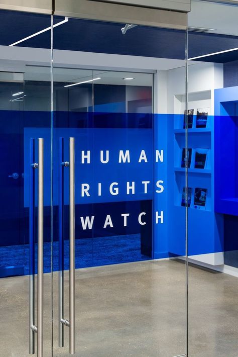 Located in Washington, D.C., this leading human rights NGO has truly created the office of the future. From wheelchair accessibility to all-gender bathrooms and automatic doors, this office prioritizes the needs of all walks of life. Secondary to making a fully accessible workspace, the HRW made sure to center their office around wellbeing and sustainability.  

#greenoffice #accessibleoffice #modernoffice #commercialinteriordesign #humanrightswatch #officeinteriordesign Glass Door Office Design, Door Signage Design, Office Glass Design, Office Door Design, Office Glass Partition, Modern Door Design, Glass Sticker Design, Sticker Design Ideas, Frosted Glass Sticker