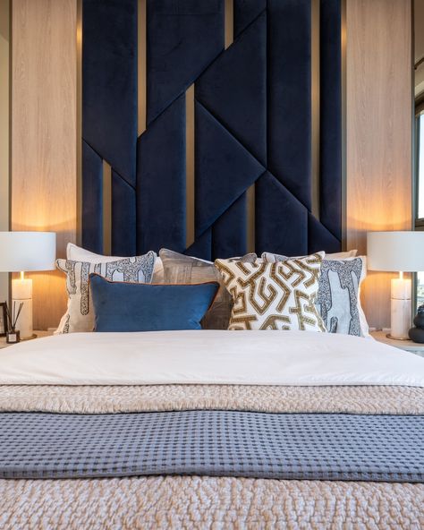 Our soft furnishings add an extra layer of comfort and luxury to this principal bedroom, while a chic chair from French designer @moustache_editions infuses the space with some Parisian flair. Photo credit: @tonymurraypho #dapaatelier #interiordesign #onethamesquay #bedroomdesign Blue Headboard, Texture Contrast, Sleek Desk, Chic Chair, Velvet Chair, French Designer, French Design, The Space, Soft Furnishings