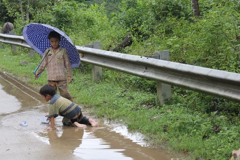 children during monsun rain, Vietnam 2012 Monsun Rain, Vietnam, Around The Worlds