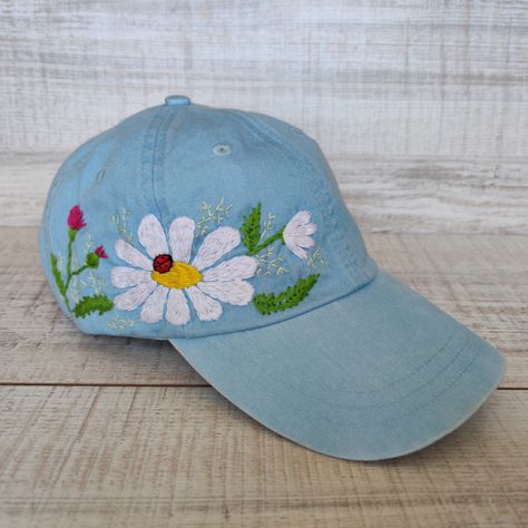 Excited to share the latest addition to my #etsy shop: Cotton cap with hand embroidered chamomile, thistle embroidery design, stitched hat with wildflower, personalized birthday gift for her https://etsy.me/3iy9lis #embroiderydesign #birthdaygifthat #handembroidered Thistle Embroidery, Felt Cowboy Hats, Jeans Clothes, Floral Embroidery Patterns, Ball Caps, Embroidered Caps, Modern Embroidery, Embroidered Jeans, Vintage Embroidery