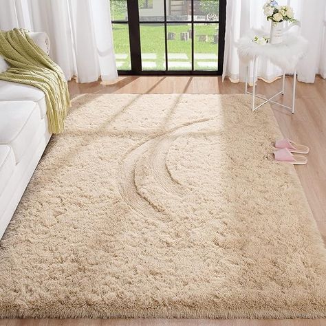 Hey! I'm an Amazon Associate! 
Aesthetic fluffy beige Carpet On Amazon!
Short Link to direct to the Item: https://amzn.to/4bNZe28 
Description:
Colour	C-Beige
Material	Microfiber
Brand	BENRON
Shape	Rectangular
Size          5x7 Ft,153x215CM Light Tan Living Room, Tan Living Room, Beige Rugs, Floor Material, Fluffy Rugs, Clothes Tips, Plush Rugs, Beige Bedroom, Kids Rug