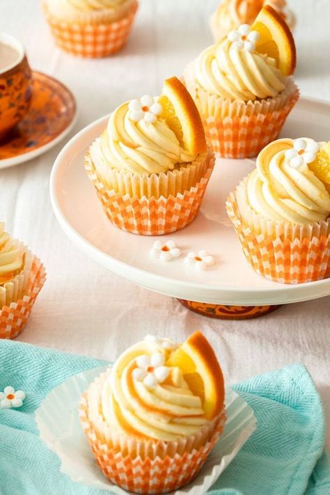 Fresh orange juice and zest in the batter gives these beautiful Orange Cupcakes a sweet, aromatic orange zing. The unbelievably creamy orange buttercream, both infused and spiked with orange zest are truly the icing on the cake. Orange Juice Cupcakes, Summer Cupcakes, Orange Buttercream, Thematic Cake, Orange Cupcakes, Fresh Orange Juice, Orange Frosting, Salty Cake, Icing On The Cake