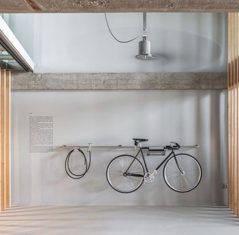 Bike Storage Architecture, Bike Workshop Design, Design Studio Workspace, Brutalism Architecture, Bike Room, Layout Architecture, Aluminum Furniture, Hallway Furniture, Bike Storage